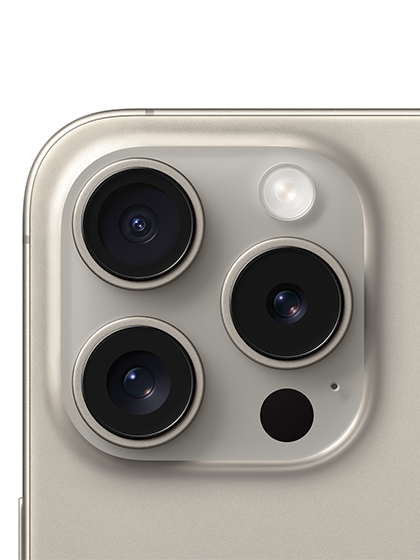 Close-up image of the rear camera setup of the iPhone 15 Pro Max, showcasing its advanced camera system. The setup includes multiple lenses and sensors arranged neatly within a square module, featuring enhanced image stabilization, improved low-light performance, and cutting-edge AI capabilities